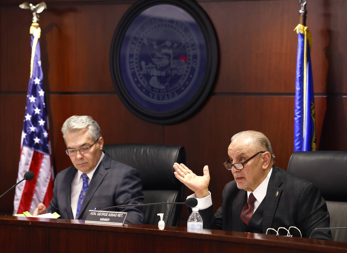 The Nevada Control Board Chairman Kirk Hendrick, left, listens to Gaming Control Board member G ...