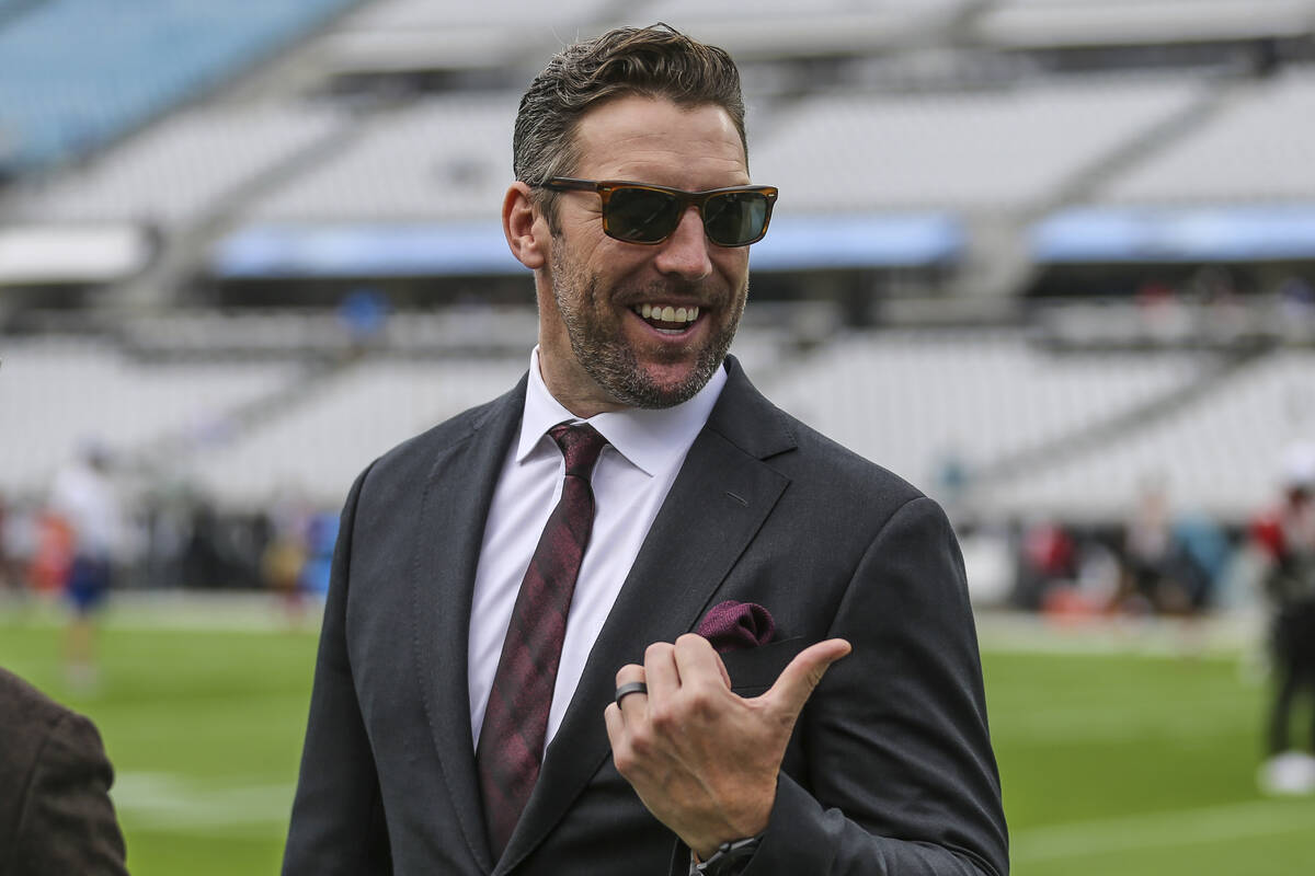 San Francisco assistant general manager Adam Peters walks the sideline during warmups before an ...