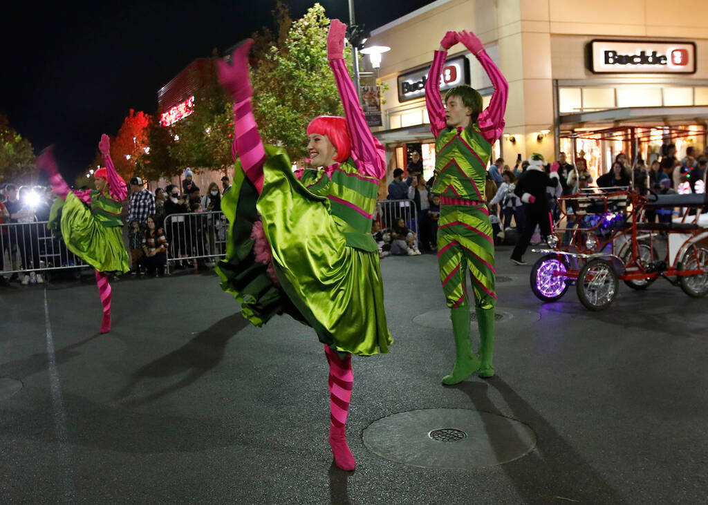 Dancers perform during the holiday parade at Downtown Summerlin on Friday, Dec. 3, 2021, in Las ...