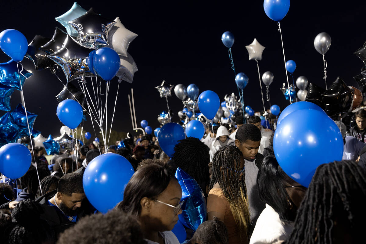 Loved ones of Desert Pines High School football player, Se’Mauri Norris-Johnson, gather ...