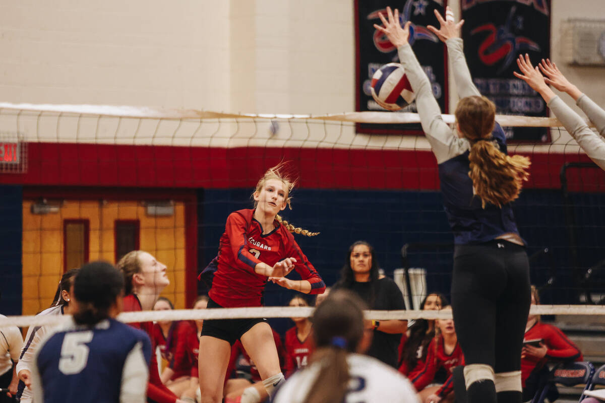 Coronado outside hitter Julie Beckham spikes the ball over the net during a Class 5A Southern R ...