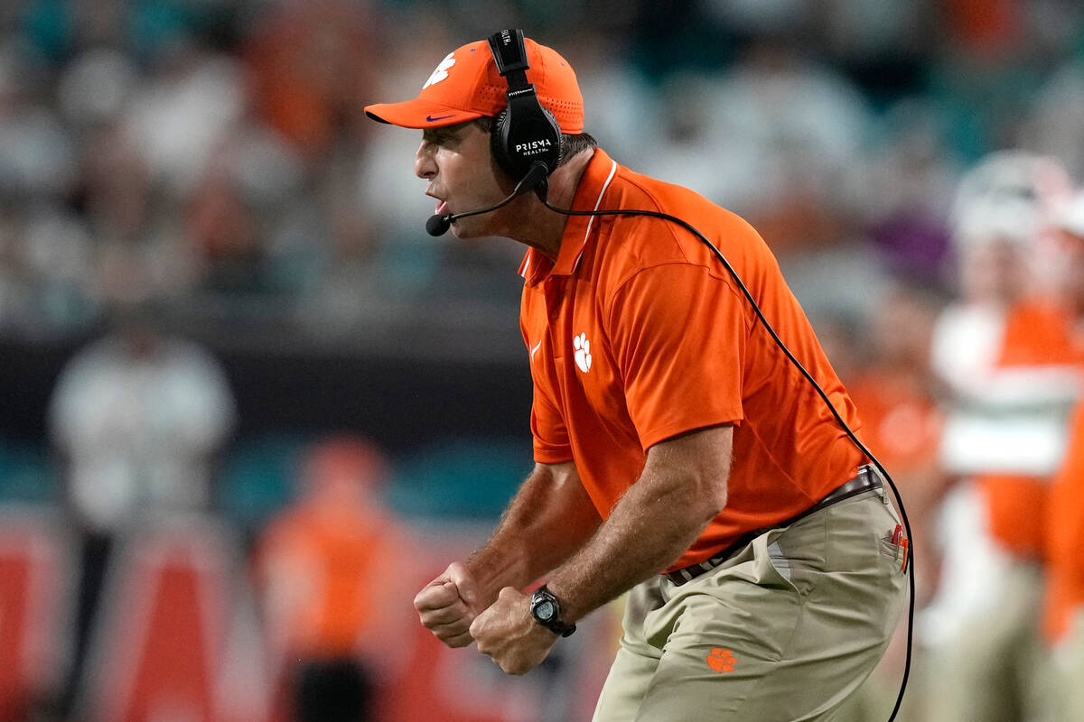 Clemson head coach Dabo Swinney watches during the second half of an NCAA college football game ...