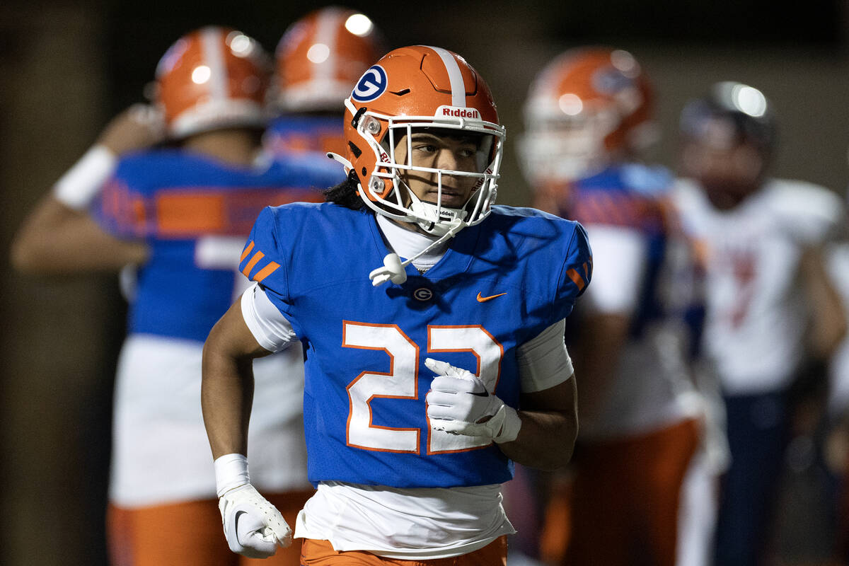 Bishop Gorman running back Micah Kaapana (22) runs to the bench after scoring a touchdown durin ...