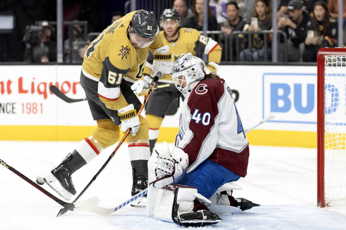 Golden Knights right wing Mark Stone (61) attempts to shoot while Avalanche goaltender Alexanda ...