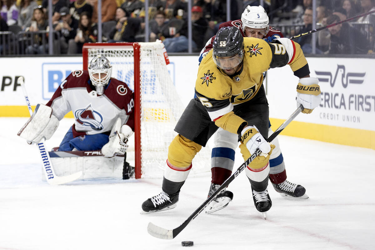 Golden Knights right wing Keegan Kolesar (55) skates for the puck while Avalanche defenseman Ja ...