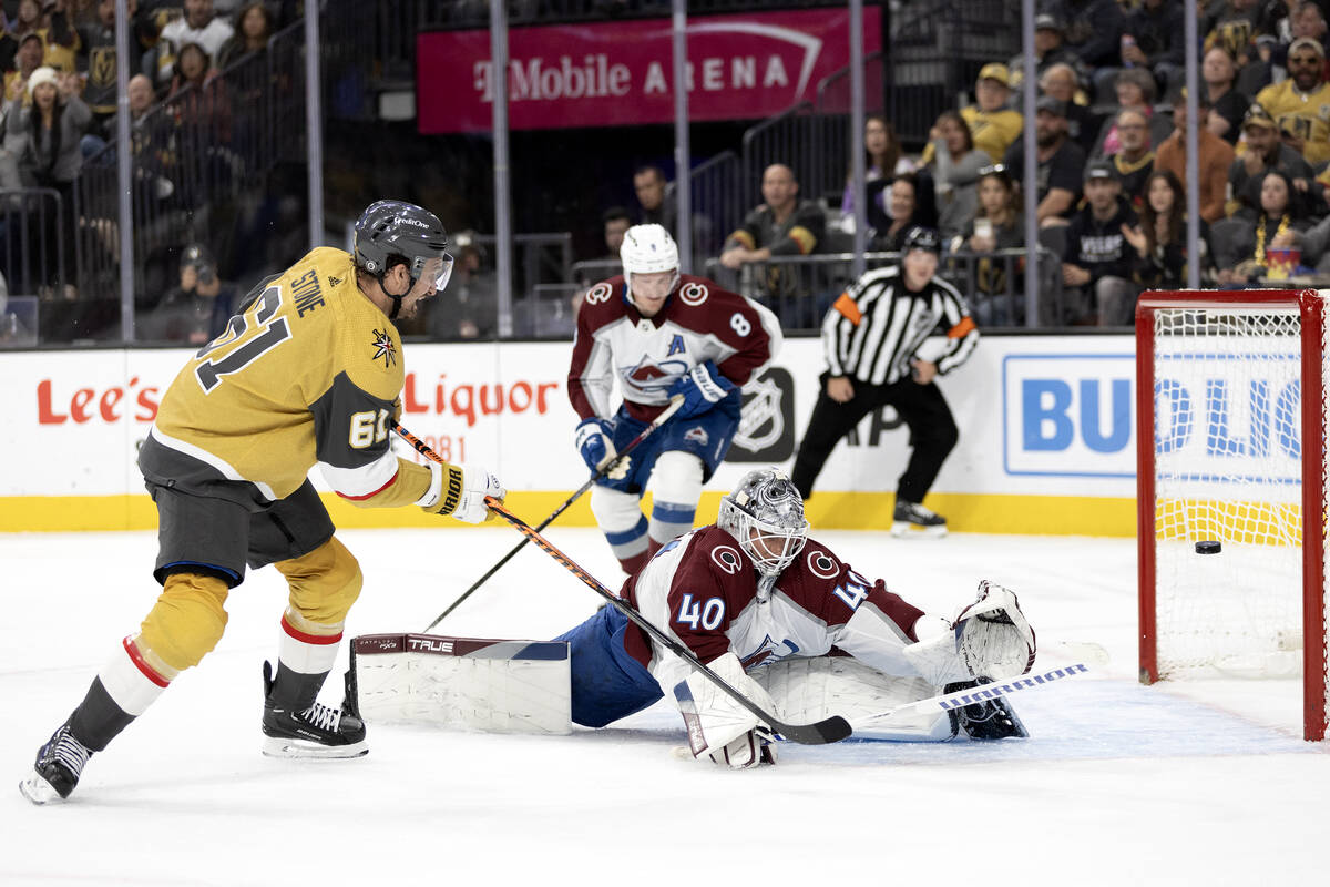 Golden Knights right wing Mark Stone (61) scores a goal on Avalanche goaltender Alexandar Georg ...