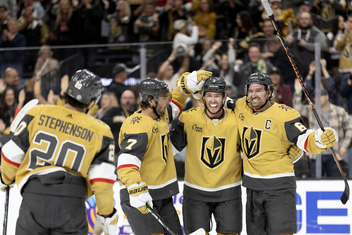 Golden Knights center Chandler Stephenson (20), defenseman Alex Pietrangelo (7), defenseman Bra ...