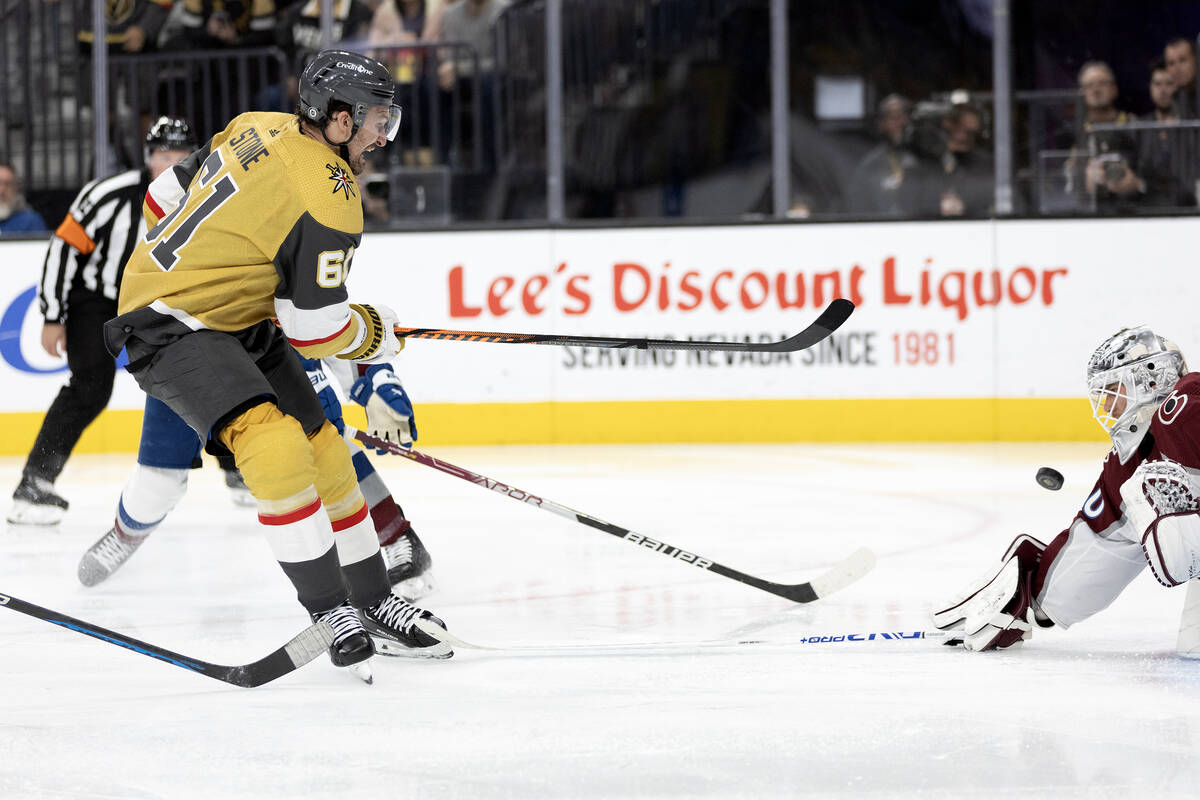 Golden Knights right wing Mark Stone (61) shoots a goal against Avalanche goaltender Alexandar ...