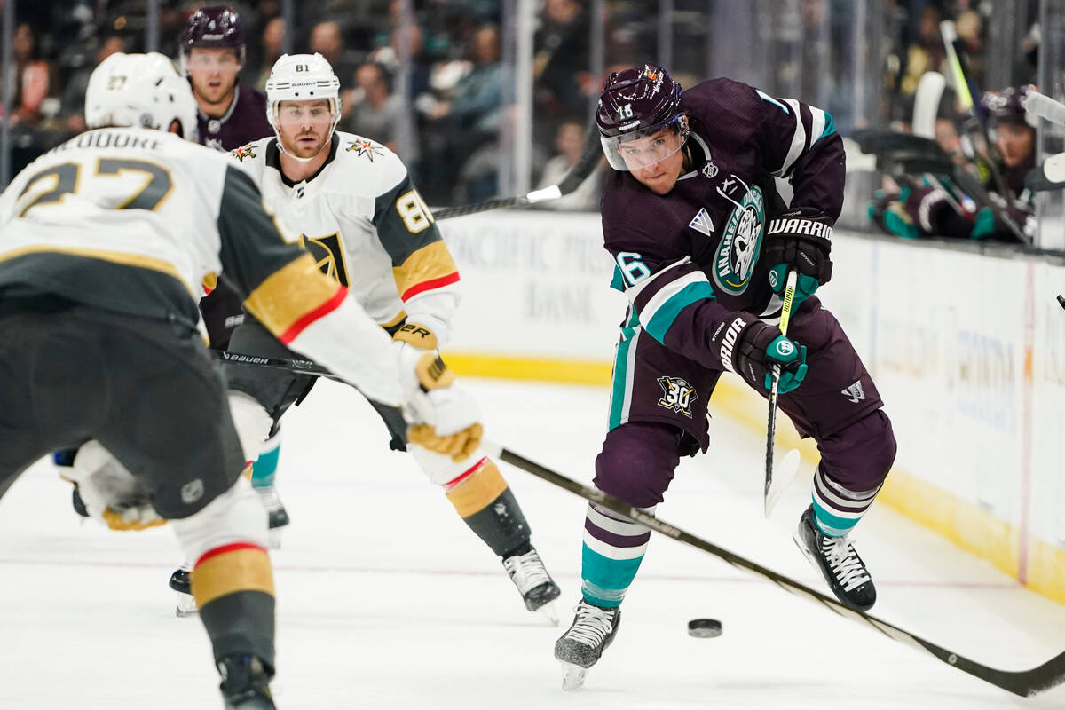 Anaheim Ducks center Ryan Strome, right, clears the puck past Vegas Golden Knights defenseman S ...