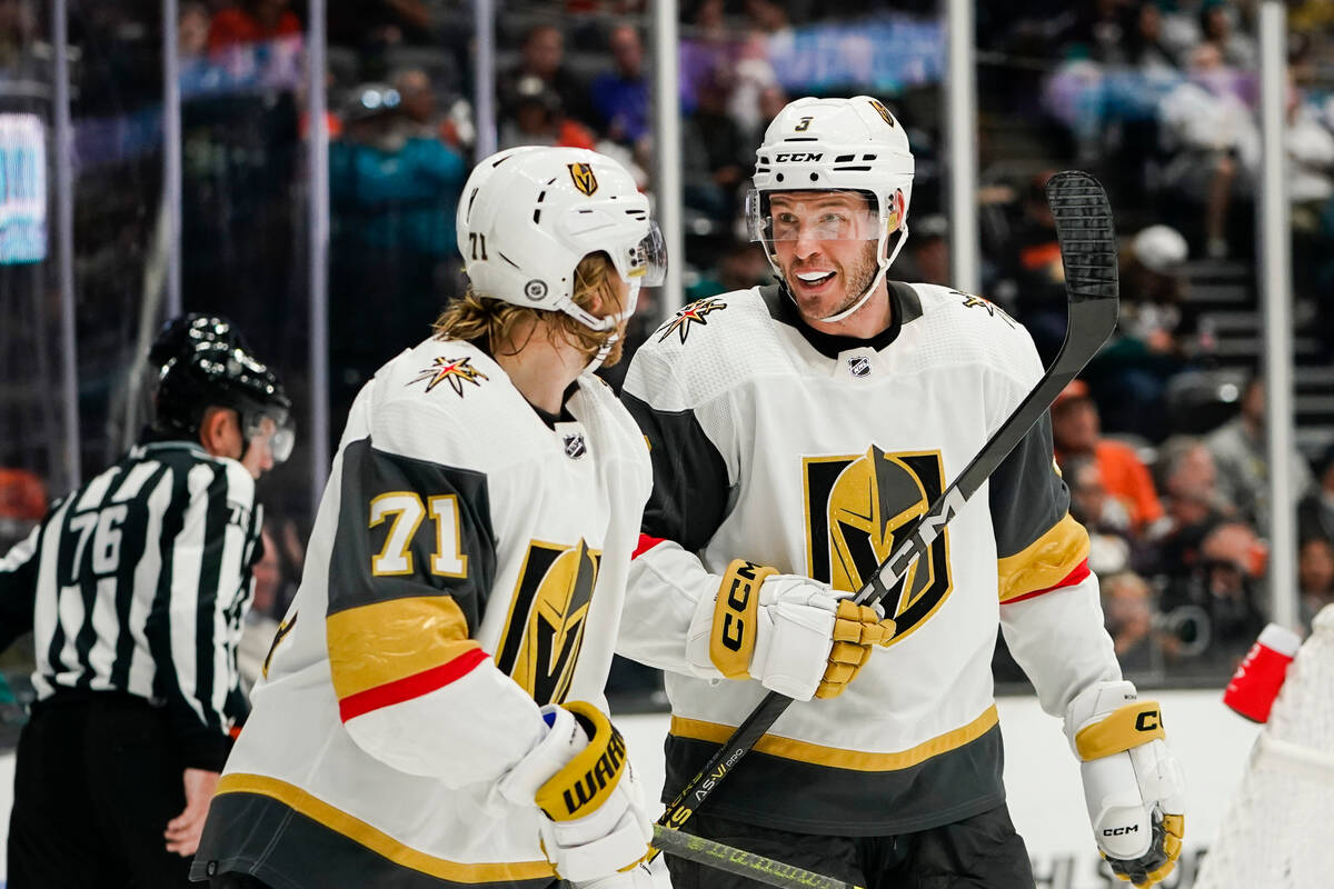 Vegas Golden Knights center William Karlsson (71) and defenseman Brayden McNabb (3) react after ...