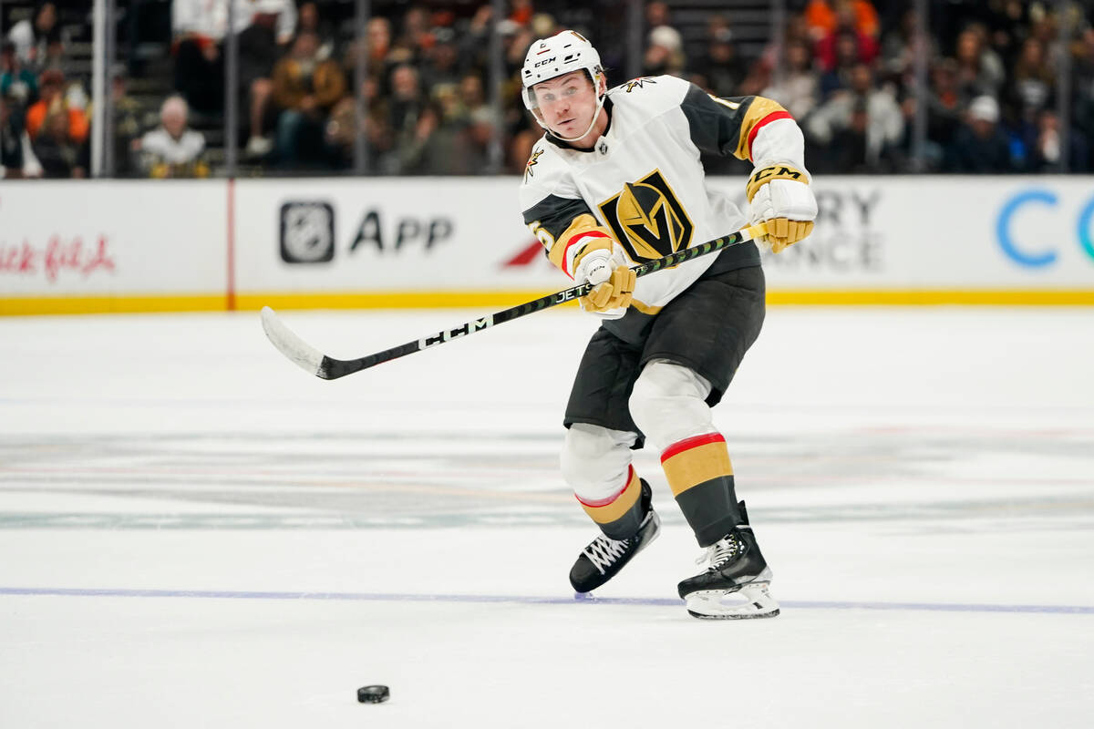 Vegas Golden Knights defenseman Kaedan Korczak passes the puck during the second period of an N ...