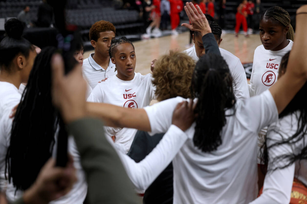 Spring Valley High basketball star Aaliyah Gayles, center, warms up with her USC teammates befo ...