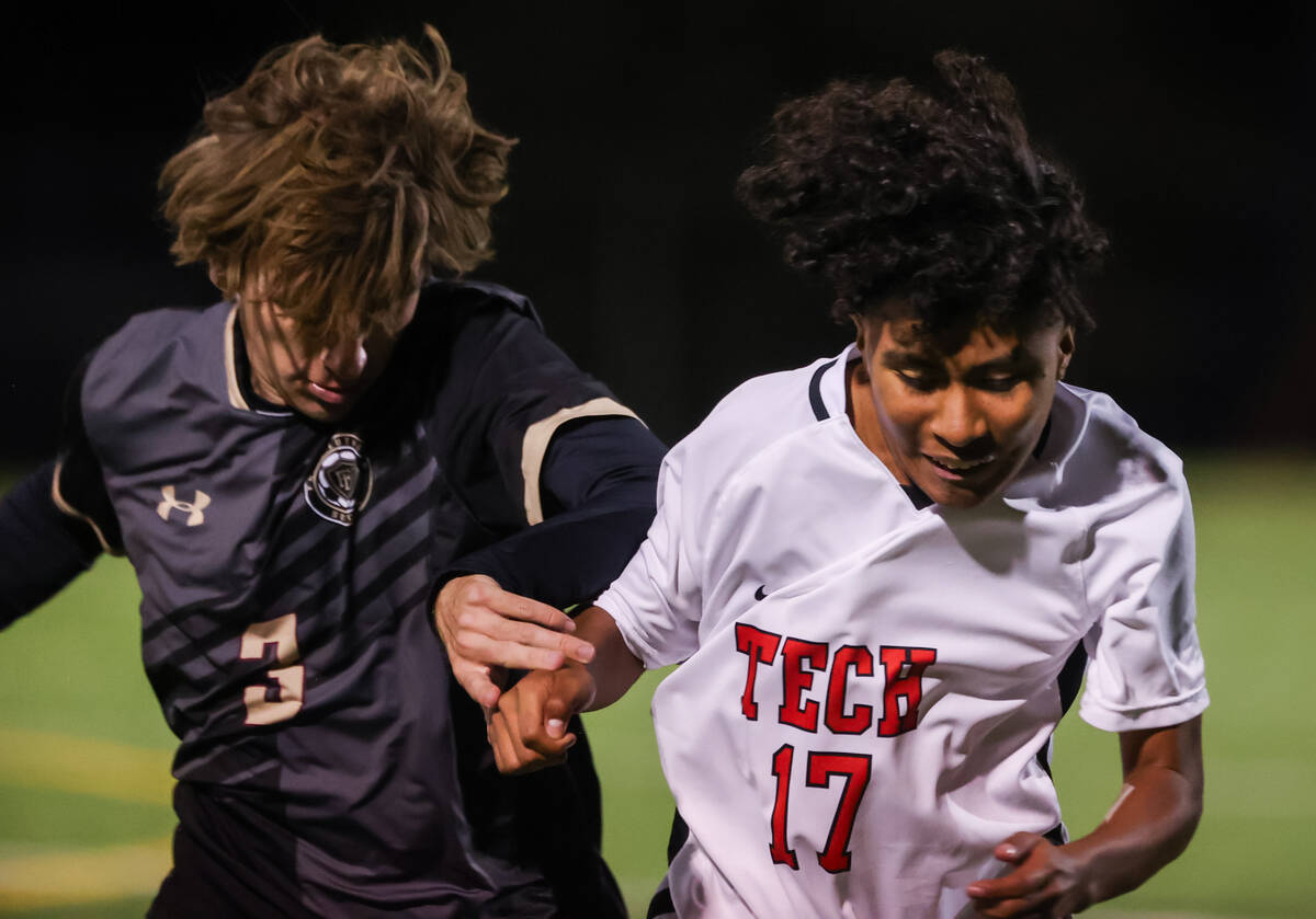 Southeast Career Technical Academy’s Jesus Dominguez (17) and Faith Lutheran’s Ka ...