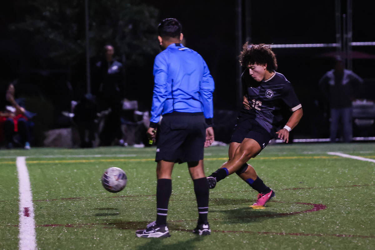 Faith Lutheran’s Cameron Sullivan (12) shoots the winning goal against Southeast Career ...