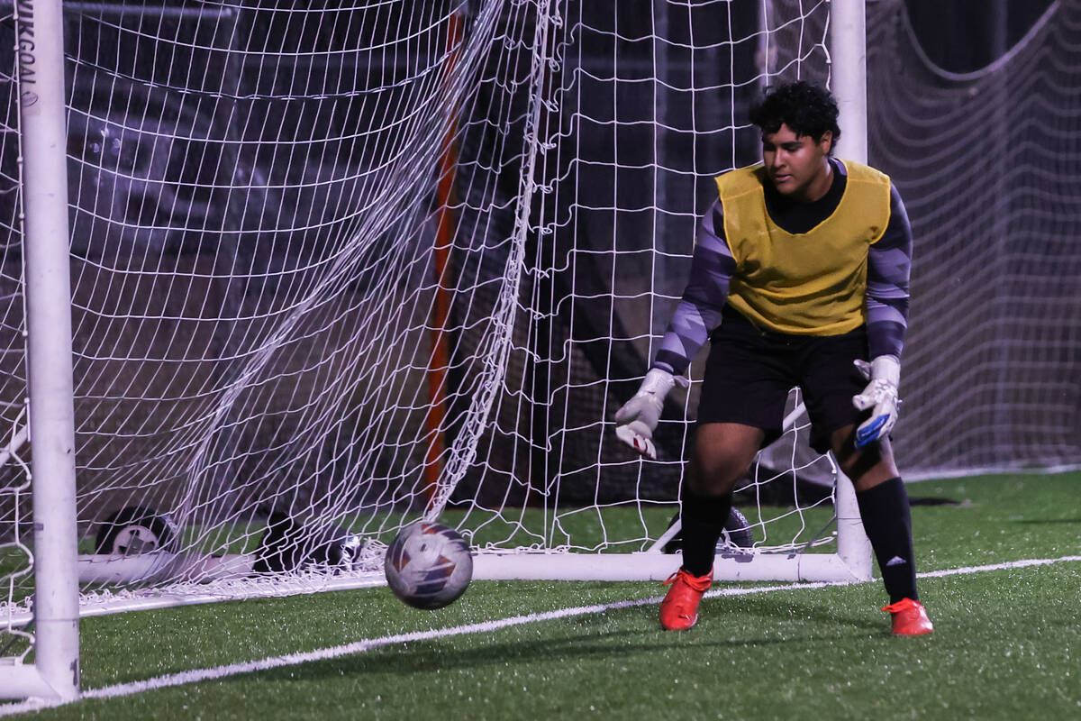 Southeast Career Technical Academy’s goalie fumbles the ball after nearly blocking the w ...