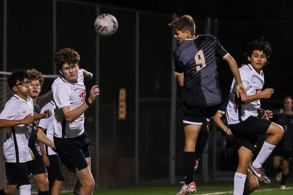 Faith Lutheran’s Ethan Otto (9) heads the ball during the 4A boys soccer state quarterfi ...