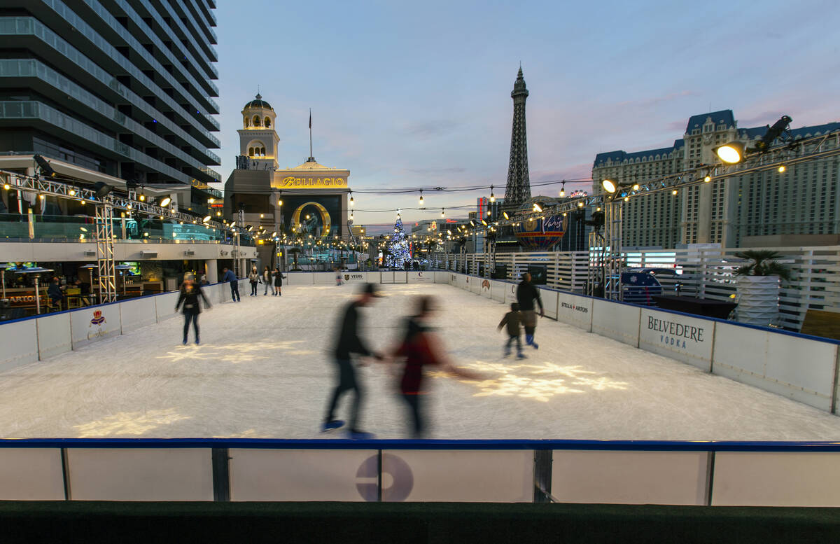 People enjoy some skating on the ice rink at The Cosmopolitan of Las Vegas in 2019, in Las Vega ...