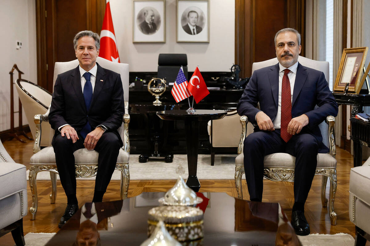 U.S. Secretary of State Antony Blinken (left) poses for a photograph with Turkish Foreign Minis ...