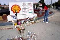 A makeshift shrine is placed at the scene of a Sunday confrontation that lead to death of a dem ...