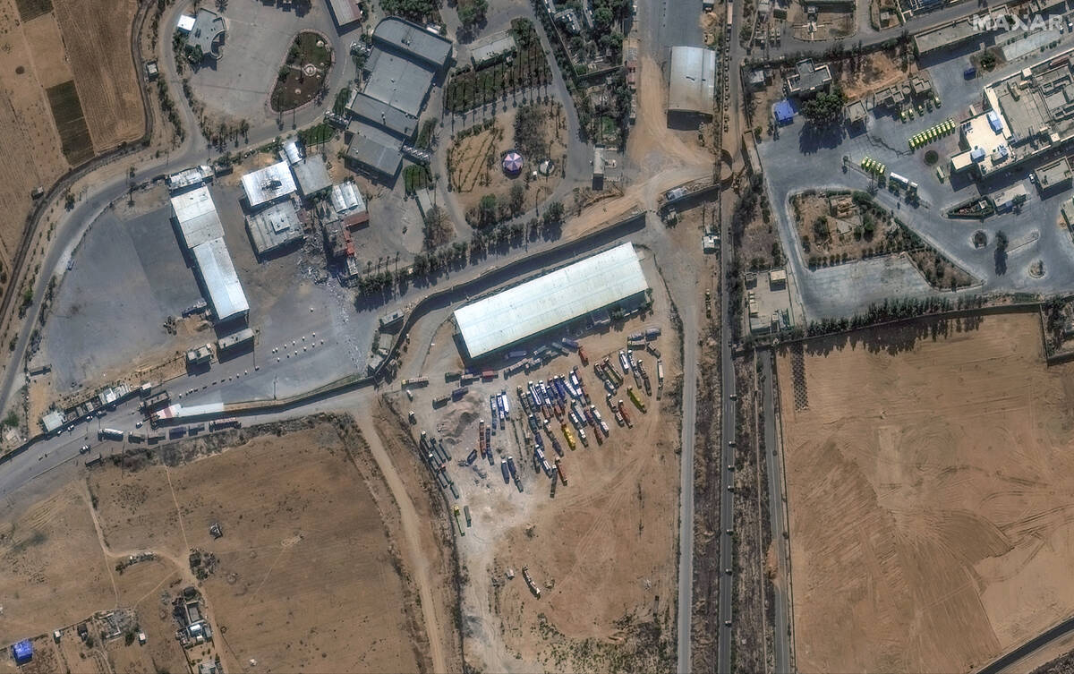 This image provided by Maxar Technologies shows a close view of the Rafah border crossing betwe ...