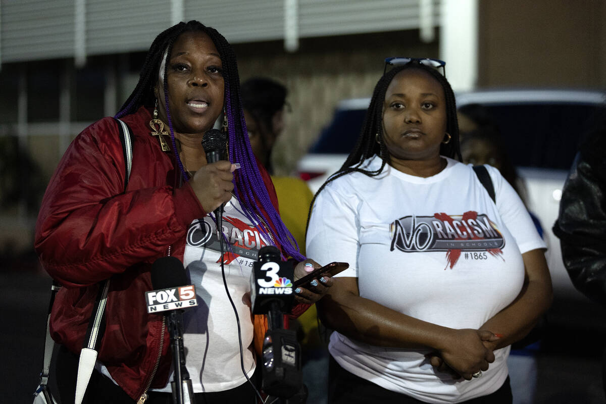 Co-founder of No Racism in Schools #1865 Akiko Cooks, left, speaks alongside fellow co-founder ...