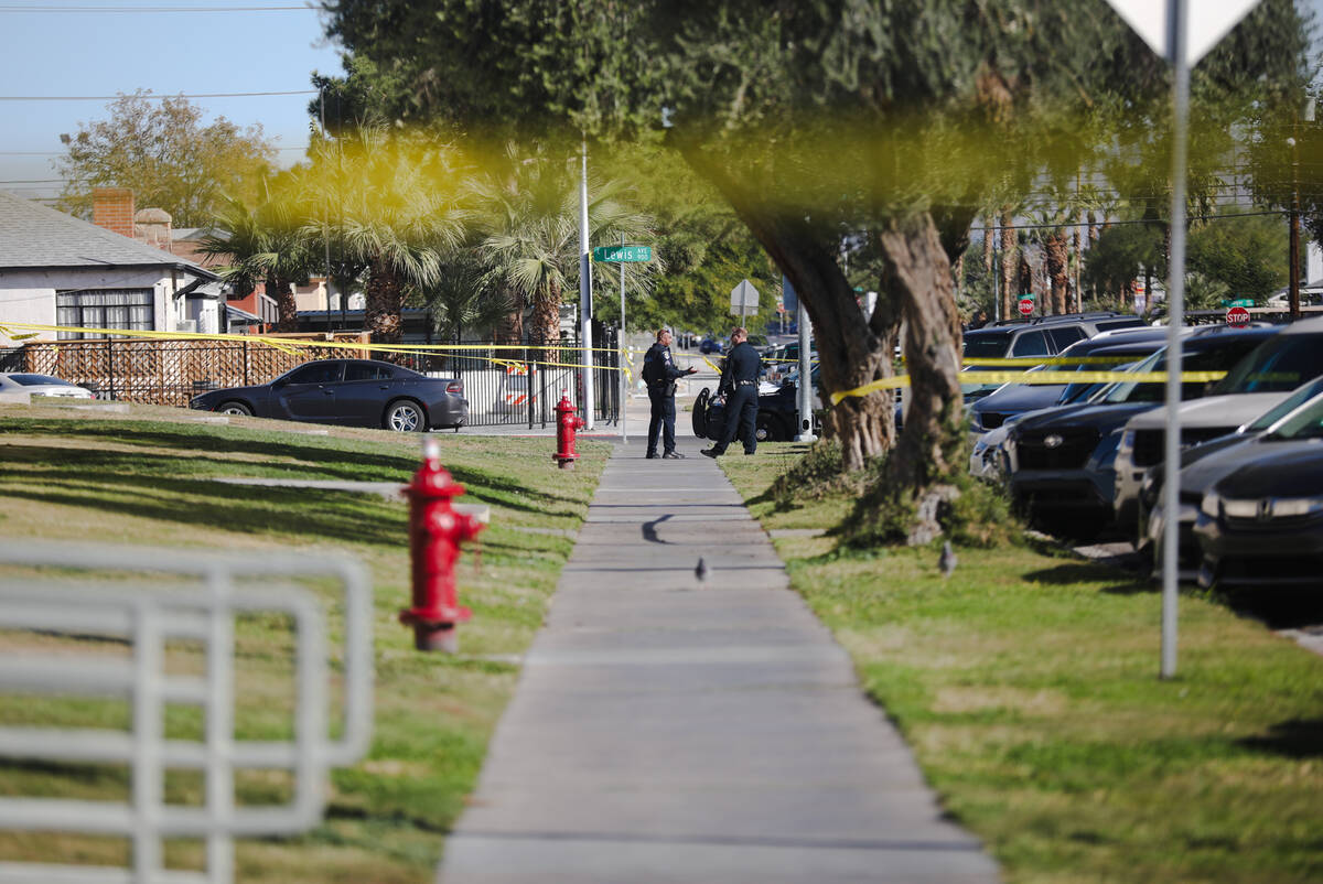 Police at the scene of a shooting that left one victim dead in the 400 block of South 10th stre ...