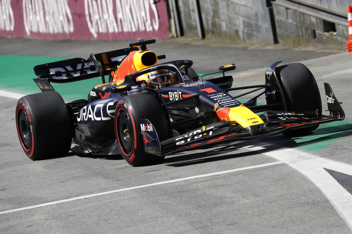 Red Bull's Max Verstappen, of the Netherlands, steers his car into the pits during the Brazilia ...