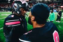 UNLV defensive back Jaxen Turner (2) celebrates with UNLV quarterback Jayden Maiava (1) after b ...