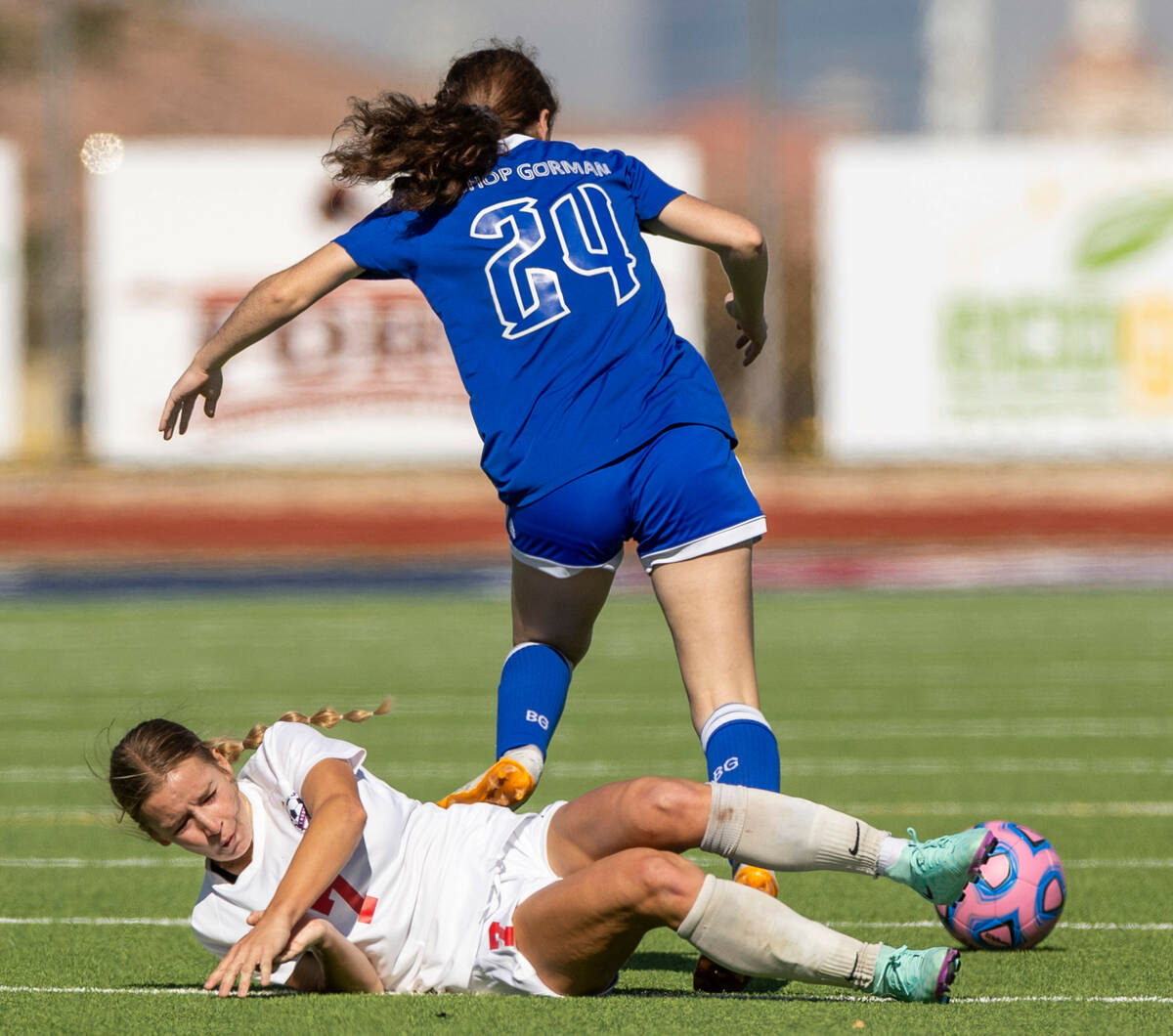 Coronado defender Kerrigyn Lynam (7) is left on the turn after being taken down by Bishop Gorma ...