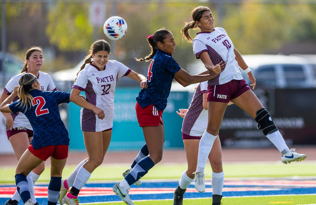 Faith Lutheran midfielder Andrea Levya (10) heads the ball past Liberty forward Ayva Jordan (14 ...