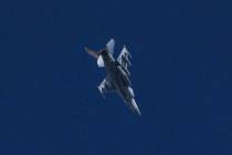 An Israeli jet fighter flies near the Gaza Strip, as seen from southern Israel, Friday, Nov. 10 ...