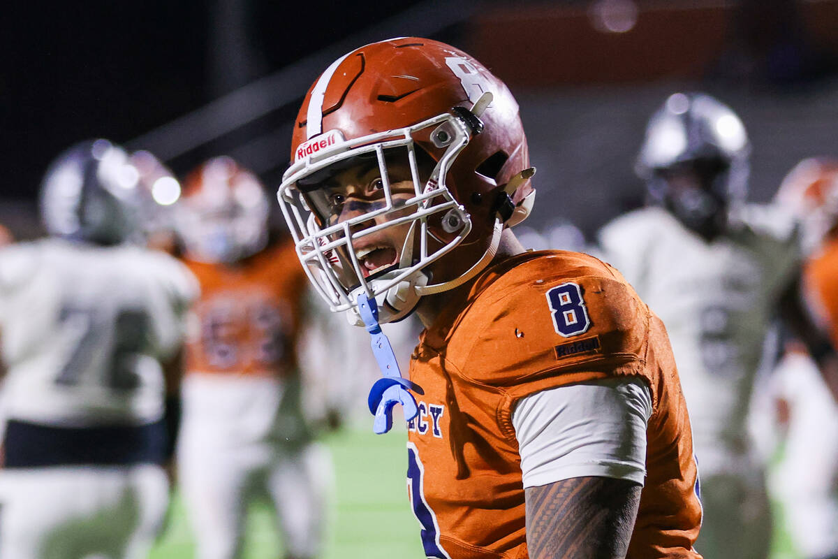 Legacy’s Phoenix Jennings (8) celebrates a touchdown during the Class 5A Division III So ...