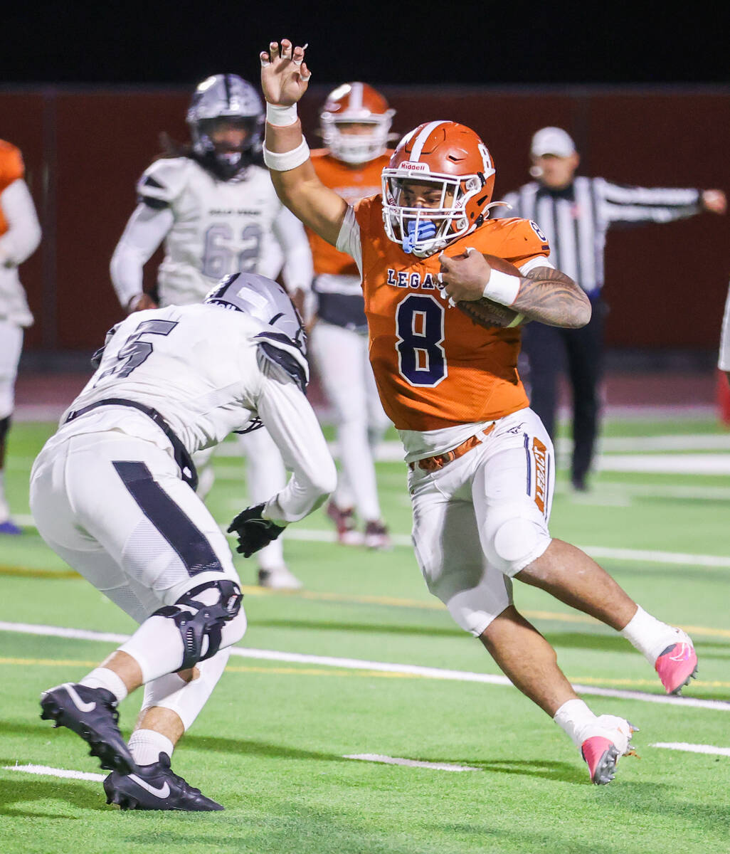 Legacy’s Phoenix Jennings (8) attempts to run around Palo Verde’s Nathan Kosa (5) ...