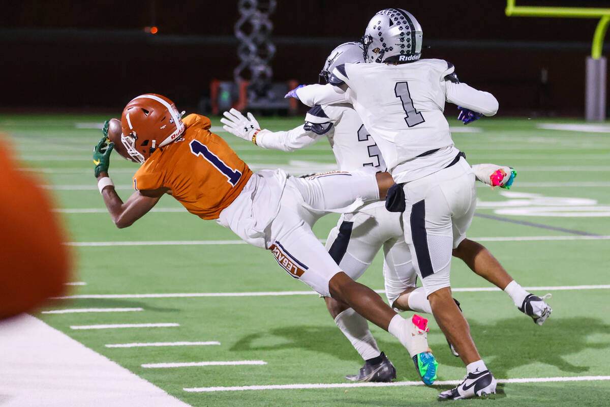 Legacy’s Dominic Oliver (1) catches a pass during the Class 5A Division III Southern Lea ...