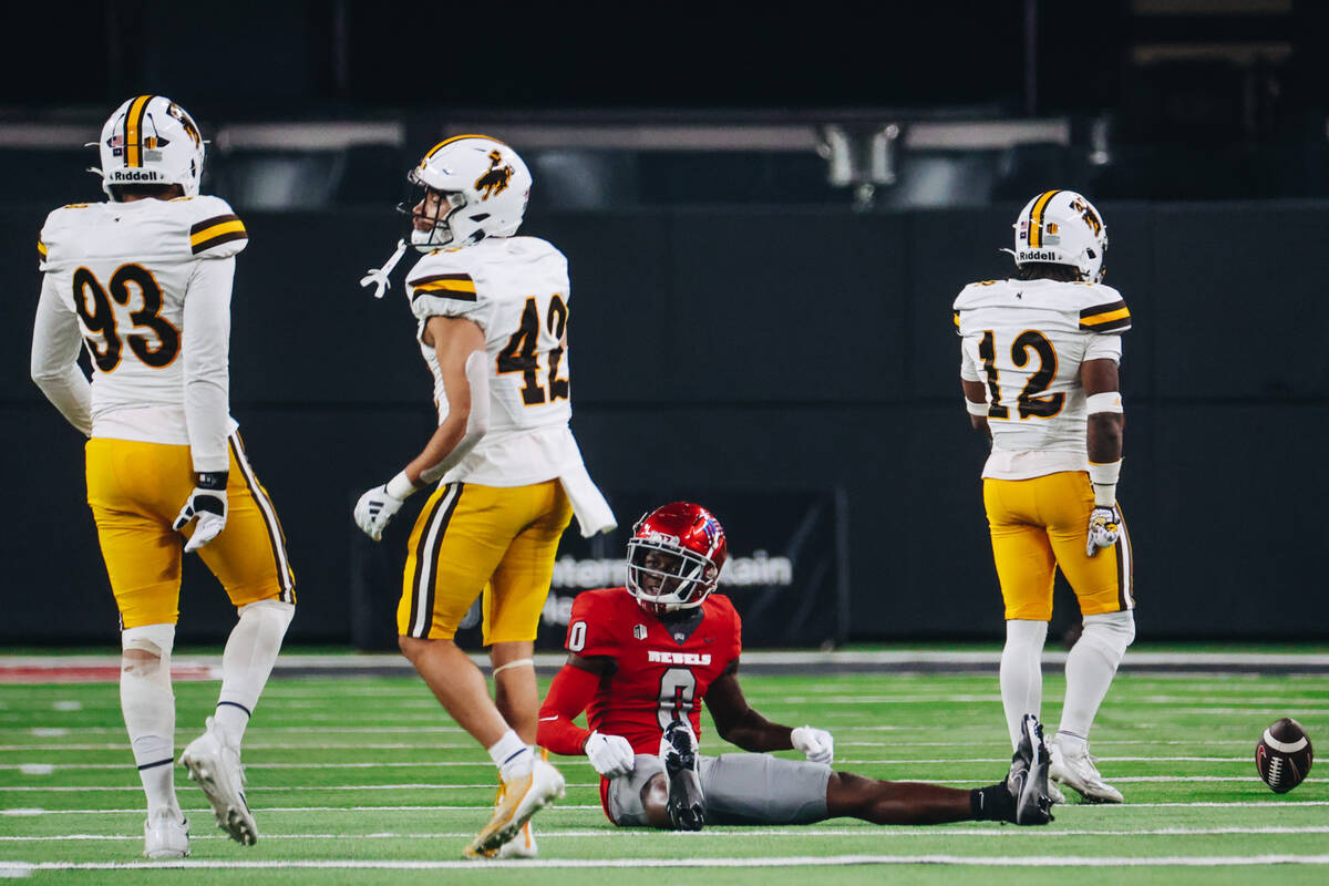 UNLV wide receiver Senika McKie (0) sits on the ground after losing the ball during a run in a ...