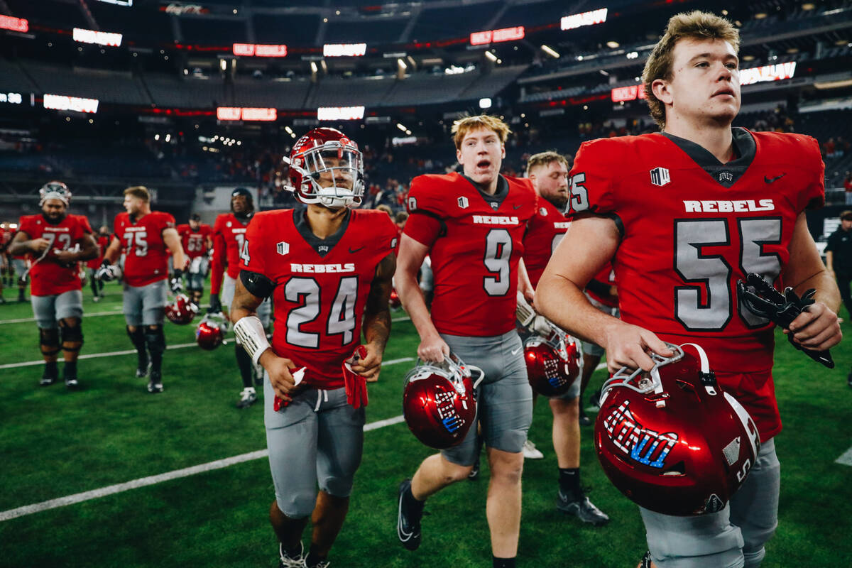 UNLV players head into the locker room after beating Wyoming at Allegiant Stadium on Friday, No ...