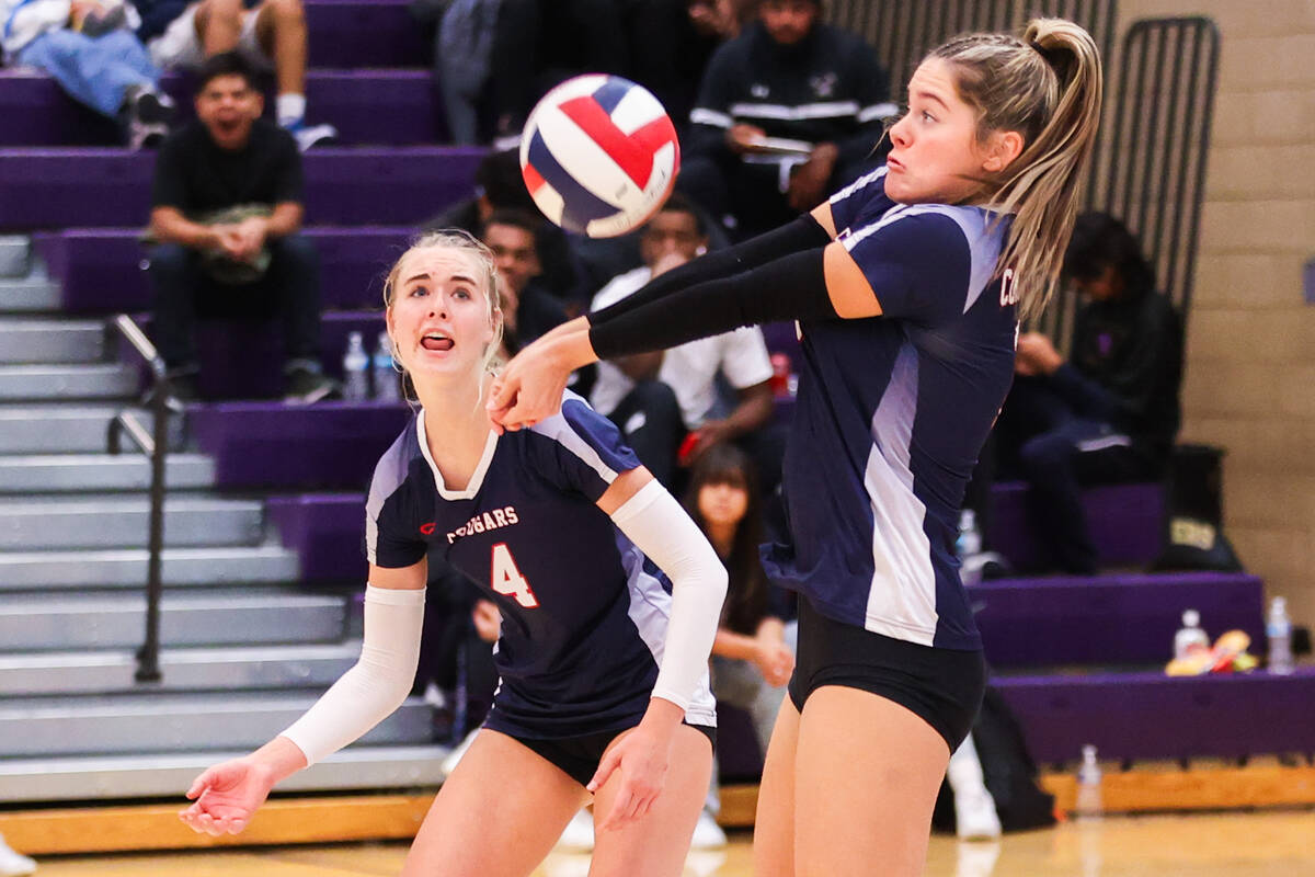 Coronado’s Gentry Oblad (4) watches teammate Reagan Vint (11) bump the ball during the c ...