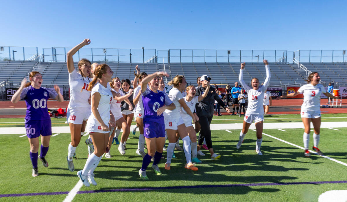 Coronado players and coaches celebrate their 2-1 win against Faith Lutheran during their Class ...