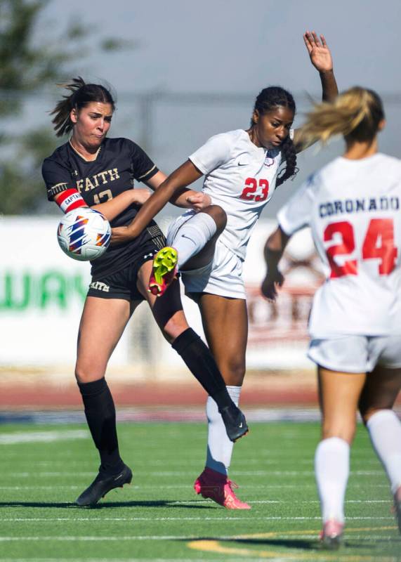 Faith Lutheran forward Julia Anfinson (17) battles for the ball with Coronado forward Sierah Mc ...