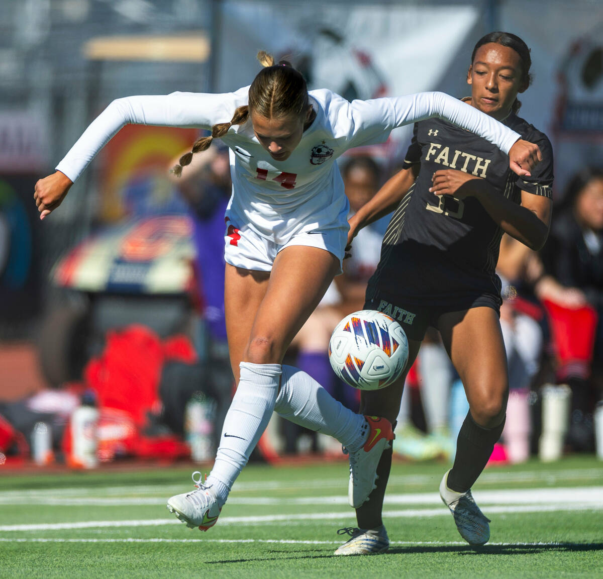 Coronado midfielder Allison Kleiner (14) is pushed while keeping control of the ball against Fa ...