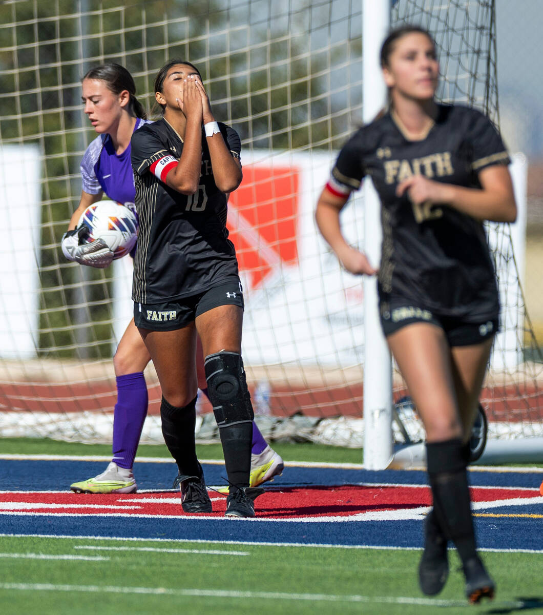 Faith Lutheran midfielder Andrea Leyva (10) is dejected after a near score against Coronado goa ...