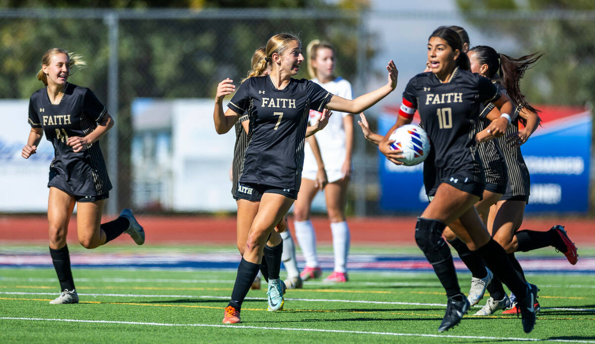 Faith Lutheran players celebrate their goal against Coronado during the second half of their Cl ...