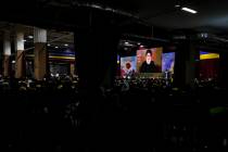 Sayyed Hassan Nasrallah via a video link, shown speaking in the southern Beirut suburb of Dahiy ...