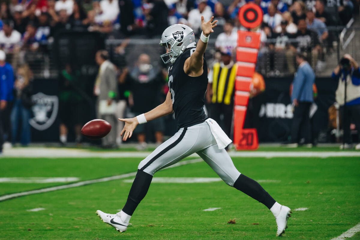 Raiders punter AJ Cole (6) punts the ball during the first half of a game against the New York ...