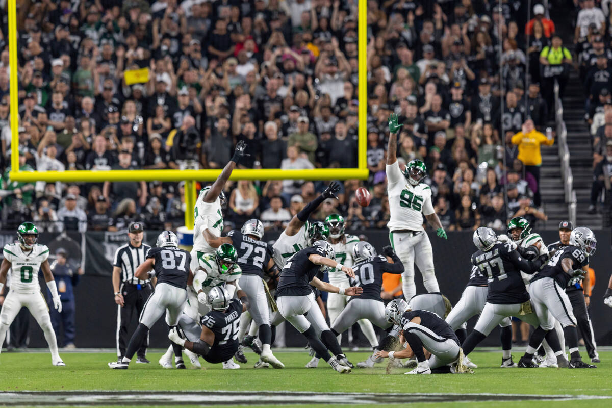 Las Vegas Raiders kicker Daniel Carlson (2) kicks a field goal against the New York Jets in an ...