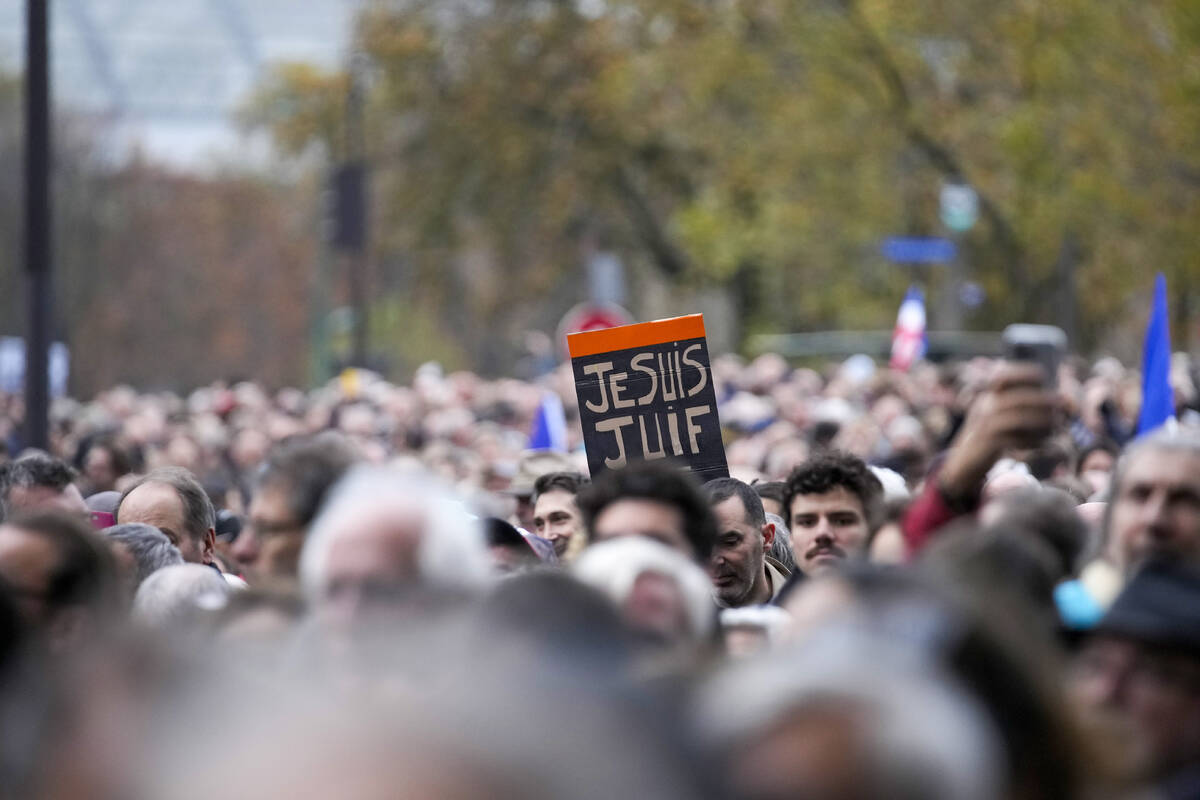 Thousands gather for a march against antisemitism in Paris, France, Sunday, Nov. 12, 2023. Fren ...