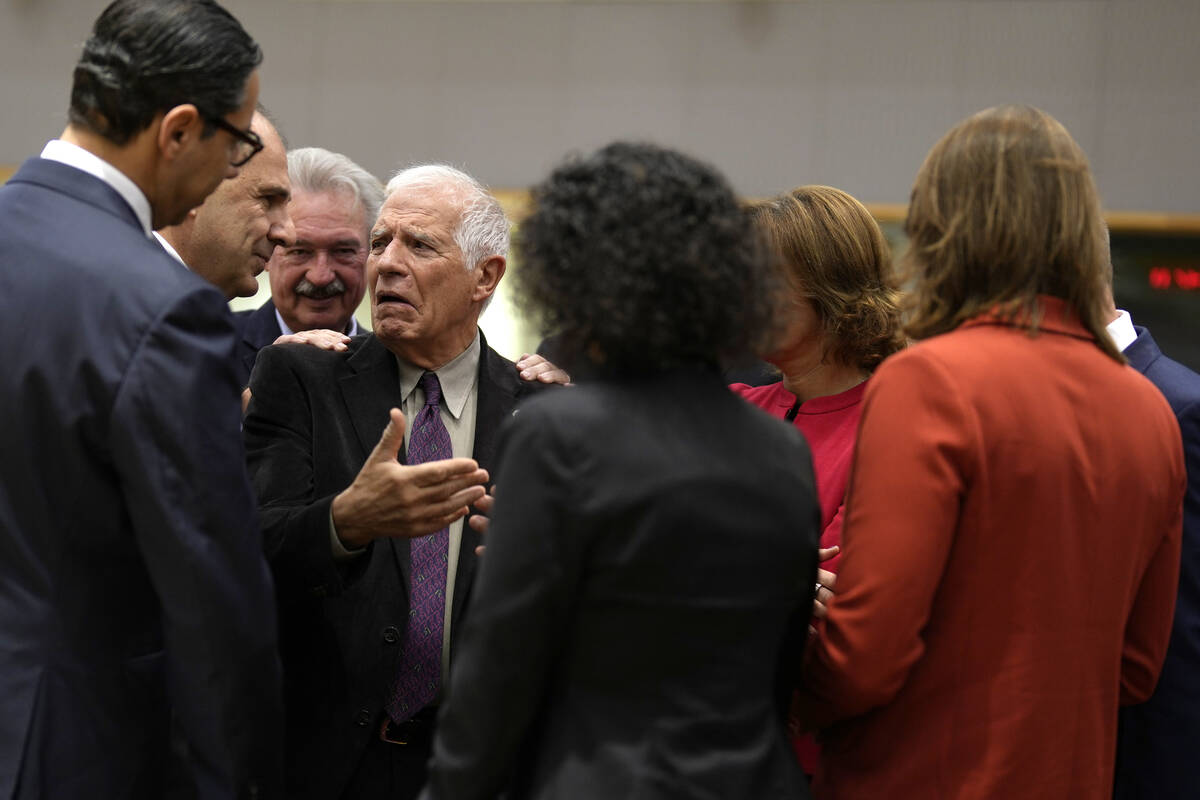 European Union foreign policy chief Josep Borrell, fourth left, speaks with from left, Cypriot ...