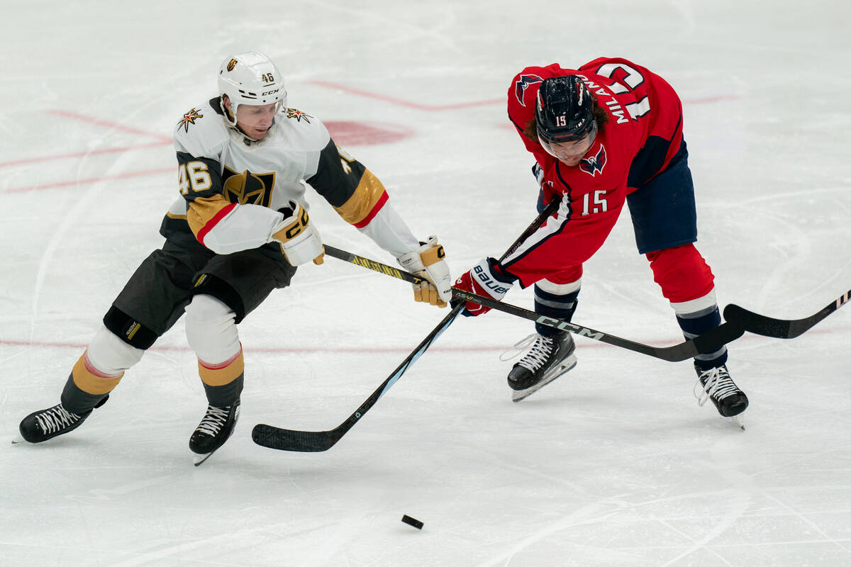 Vegas Golden Knights right wing Jonas Rondbjerg and Washington Capitals left wing Sonny Milano ...