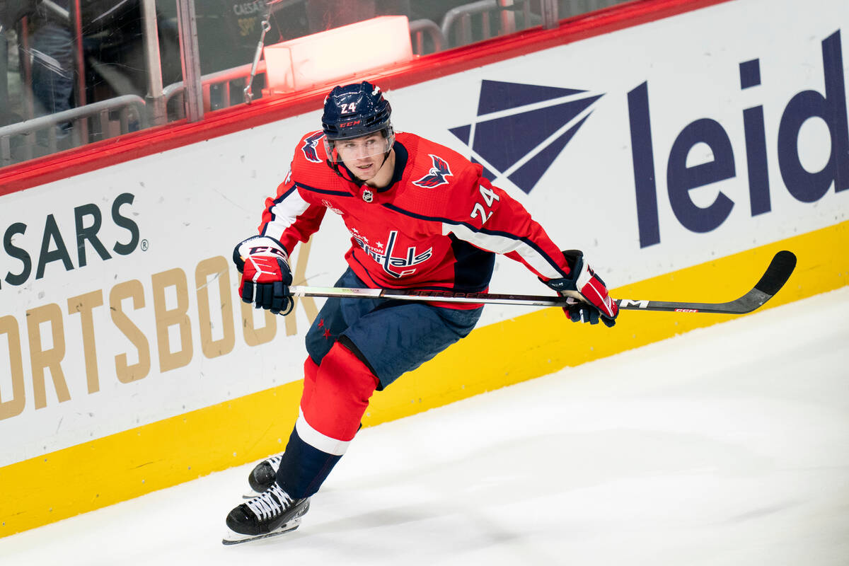 Washington Capitals center Connor McMichael reacts after scoring an empty-net goal in the third ...