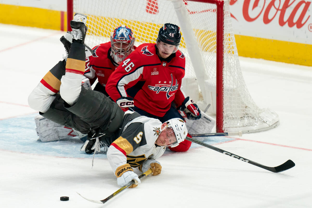 Washington Capitals goaltender Charlie Lindgren (79) and Capitals defenseman Lucas Johansen (46 ...